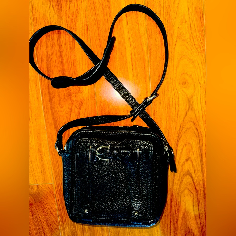 Black leather crossbody bag. Super cute and stylish.
